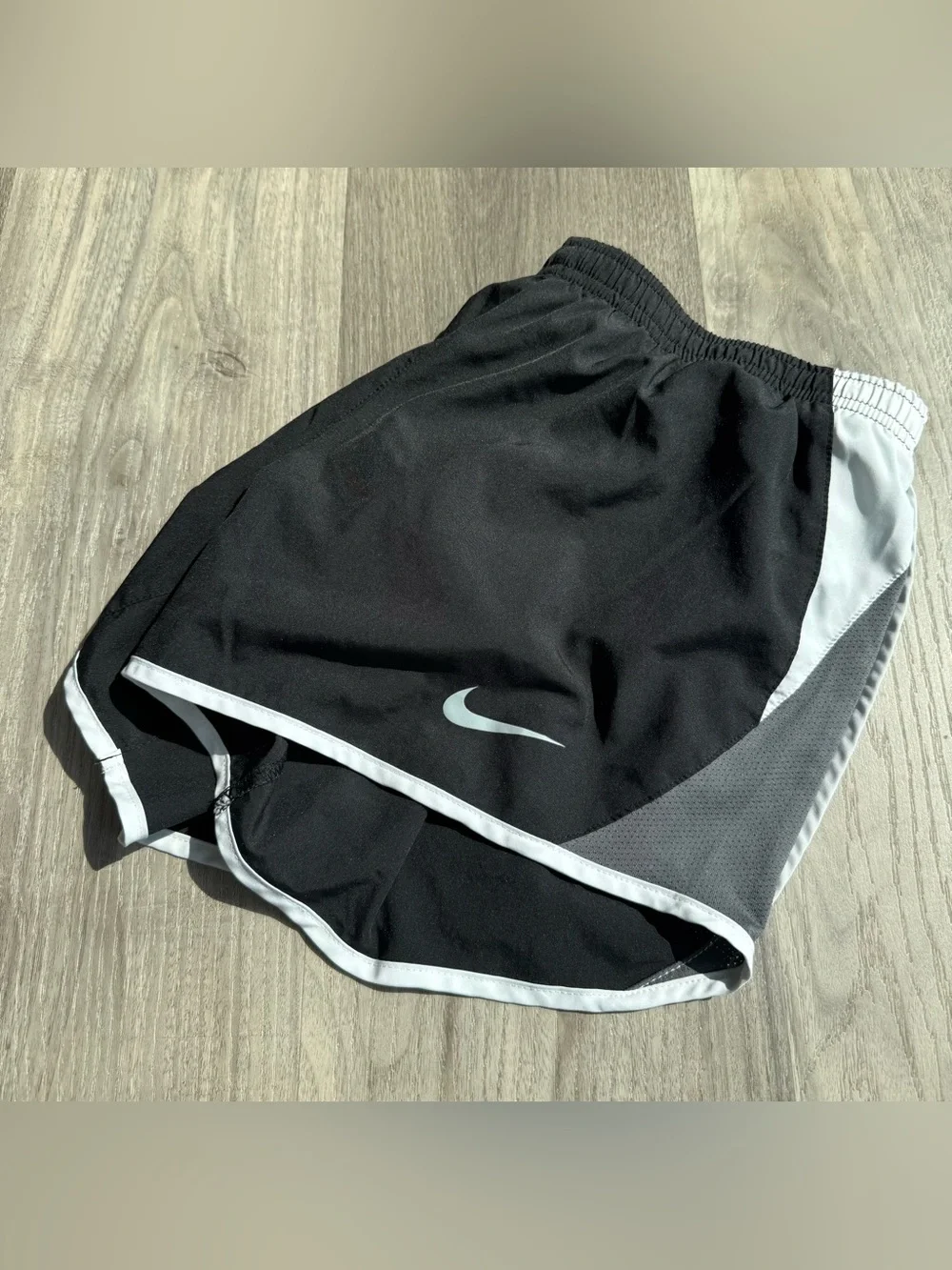 Nike Black Athletic Shorts with White Trim and Swoosh Accent, 3” inseam